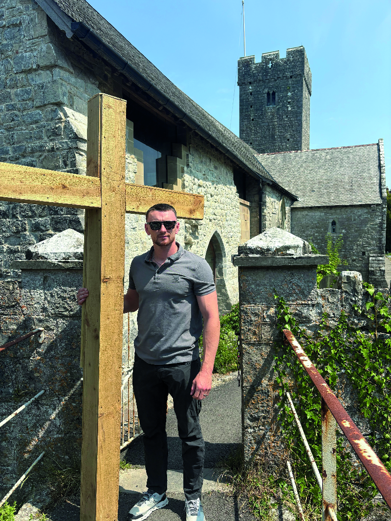 Tom with cross